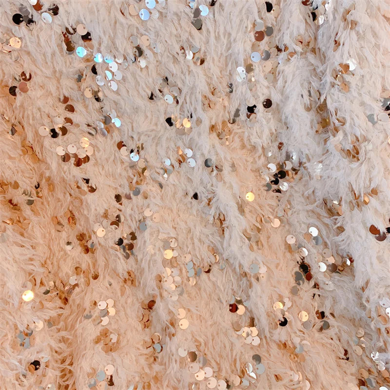 Chemisier plumes paillettes manches longues, élégant fête printemps-automne.