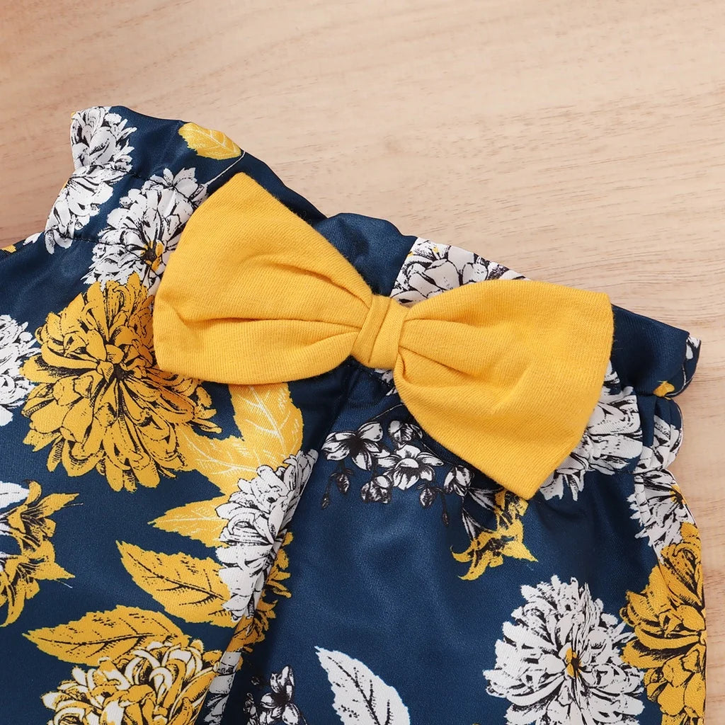 Ensemble bébé fille 3 pièces 0-18 mois : body manches courtes, pantalon fleuri et bandeau.