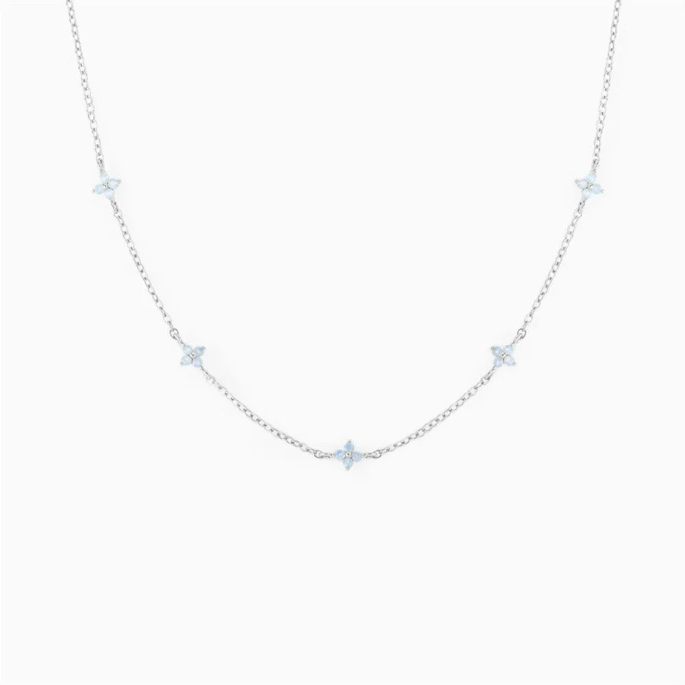 YIKOOLIN Collier Femme – Fleur Bleue Luxe, Design Minimaliste, Style Européen Américain
