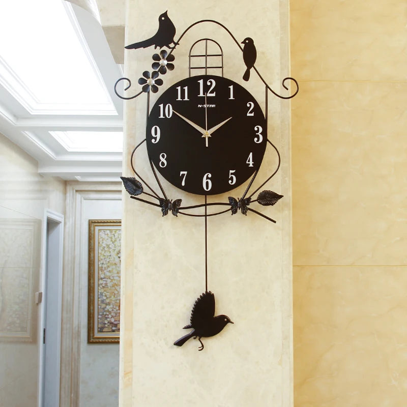 Horloge murale fer noir oiseau﻿– grande, électronique, durable, design moderne, arts et artisanat