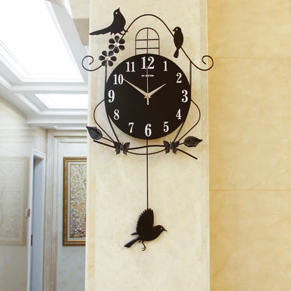 Horloge murale fer noir oiseau﻿– grande, électronique, durable, design moderne, arts et artisanat