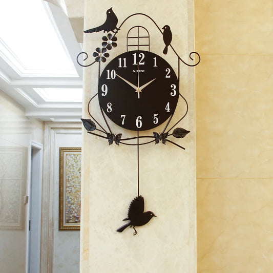 Horloge murale fer noir oiseau﻿– grande, électronique, durable, design moderne, arts et artisanat
