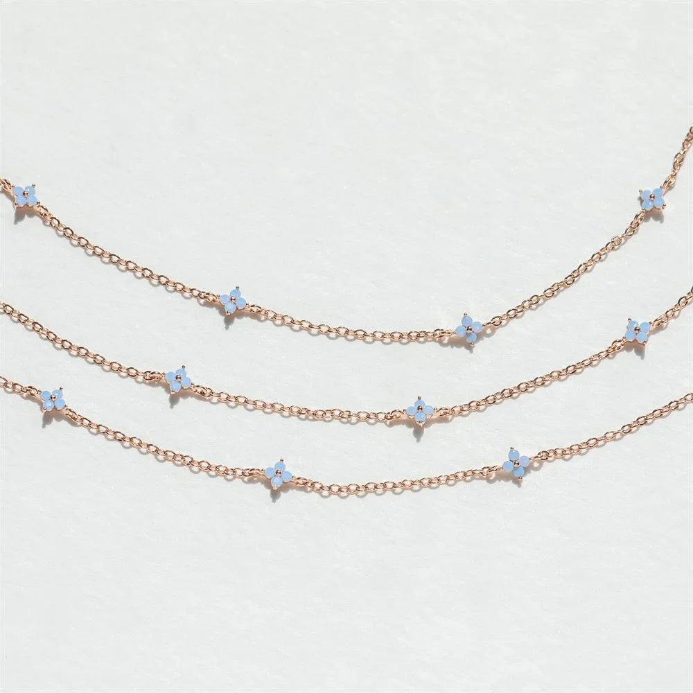 YIKOOLIN Collier Femme – Fleur Bleue Luxe, Design Minimaliste, Style Européen Américain