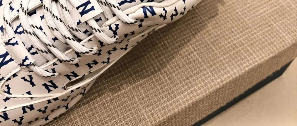 Baskets sport homme respirantes, semelle épaisse, coupe basse.