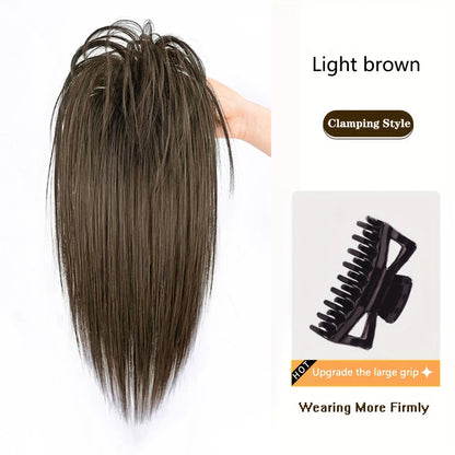 Queue de cheval synthétique OLA bouclée courte à pince noire .